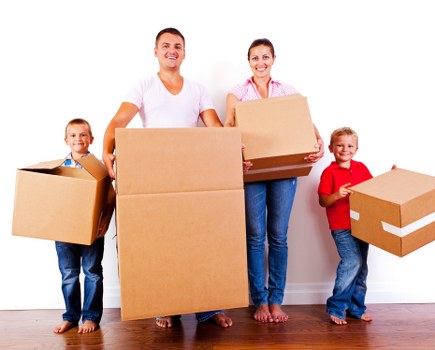 Removal van and moving team handling a house move in Woodford Green