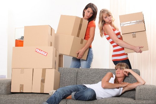 Team loading furniture with care during a local removal job