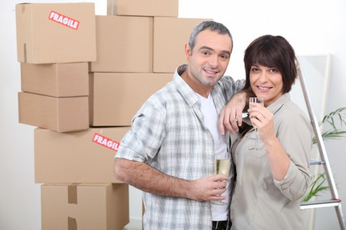 Unpacking boxes into a new home after a move in Woodford Green